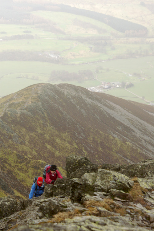 The two of them coming up the ridge