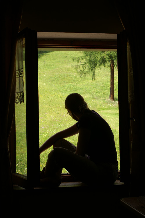 Ruth silhoutted in the window